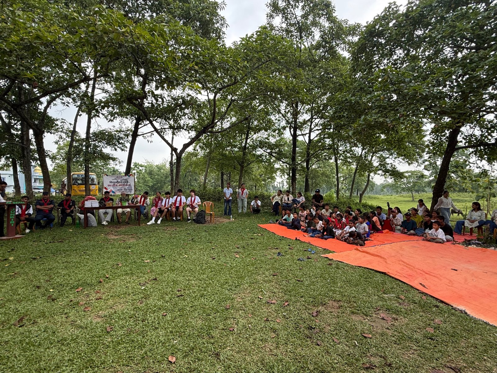 Students gathered at an outdoor community event