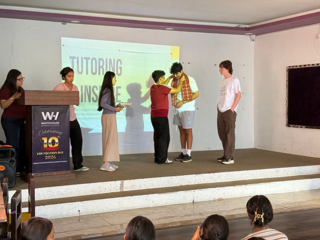 Tutoring2Inspire recognized at a school program